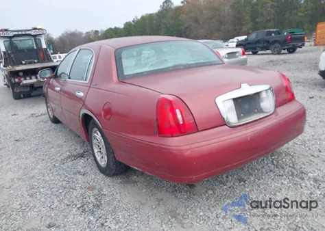 1998 Lincoln Town Car Signature из США, поврежденный, VIN 1LNFM82W2WY701062